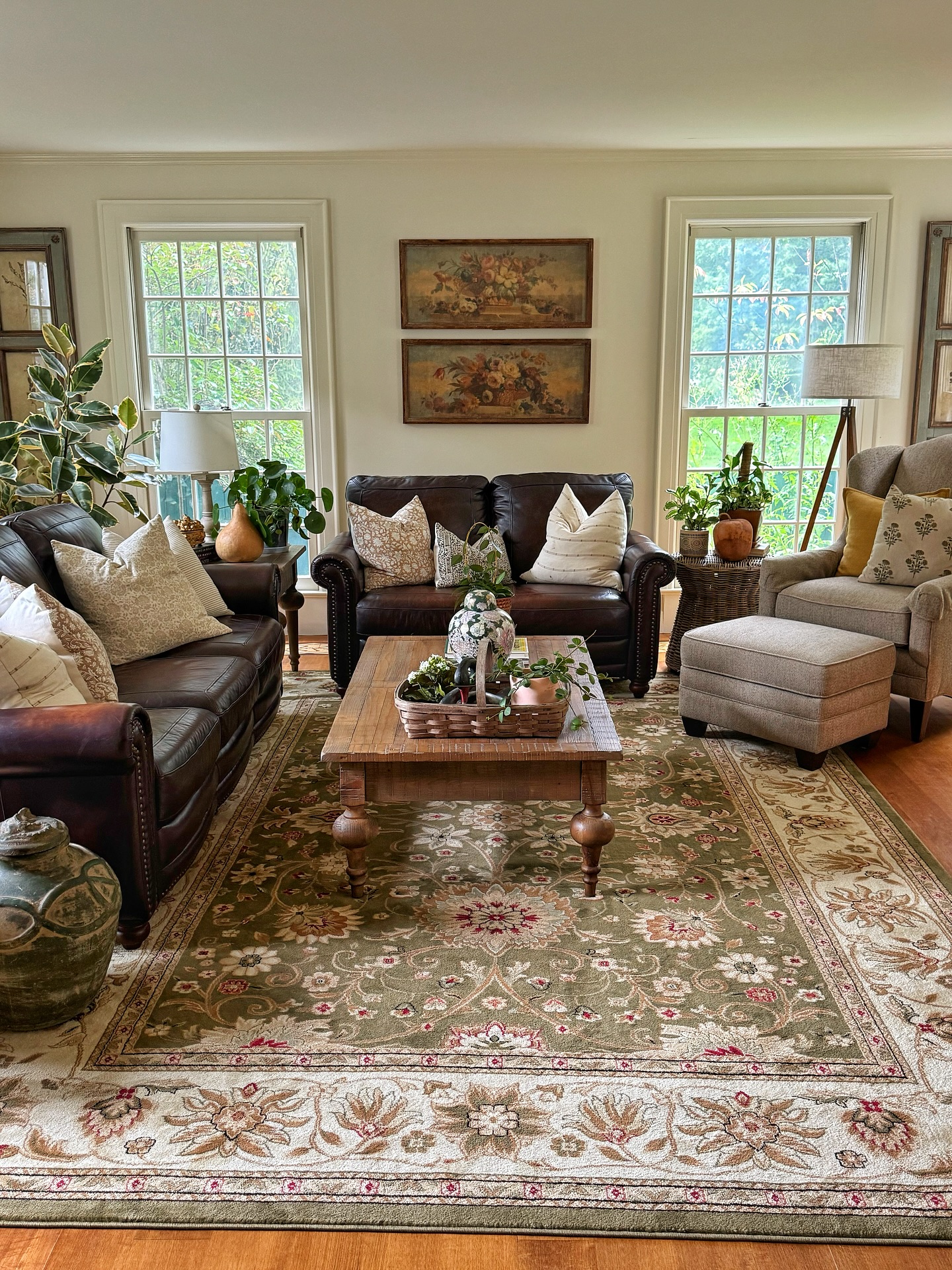 5. Lighten Dark Seating With Pillows and Greenery