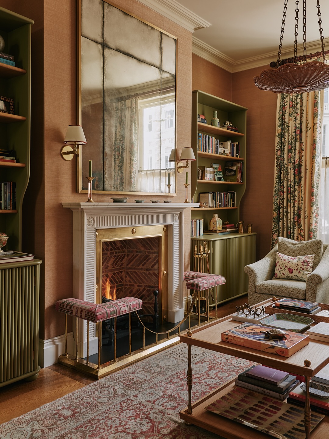 17. Frame the Fireplace With Useful Painted Bookcases