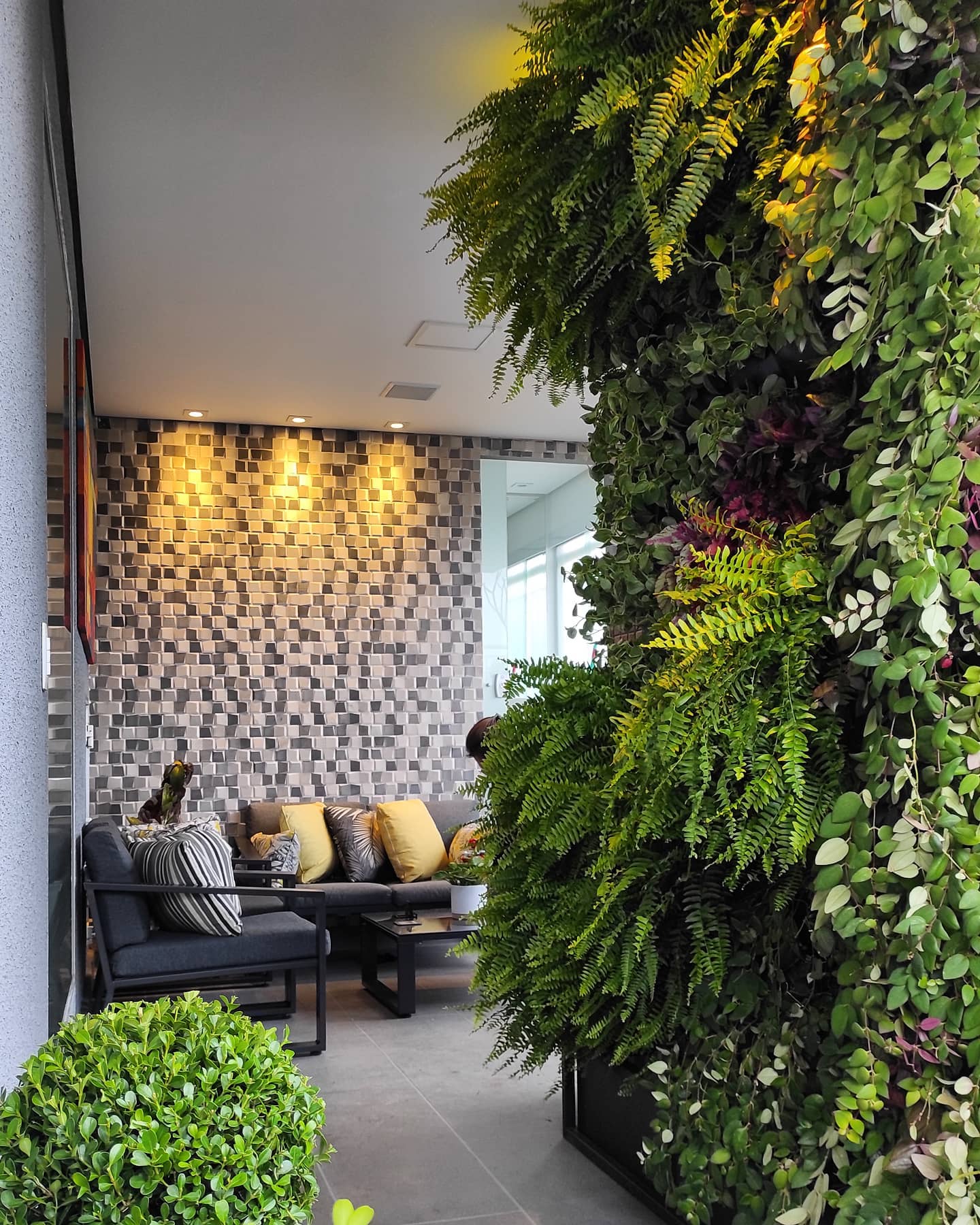 4. Give a Covered Lounge a Living Wall