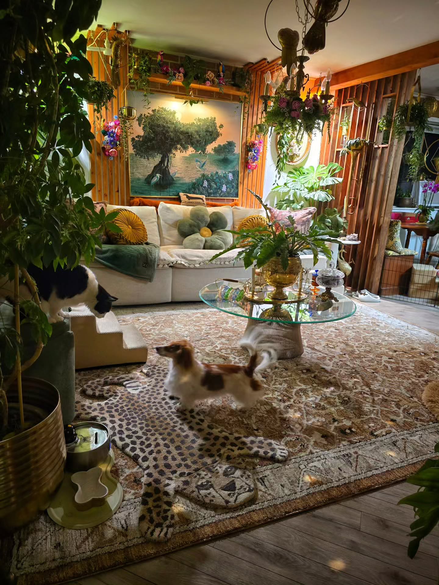 5. Layer Greenery Around a Pale Sofa