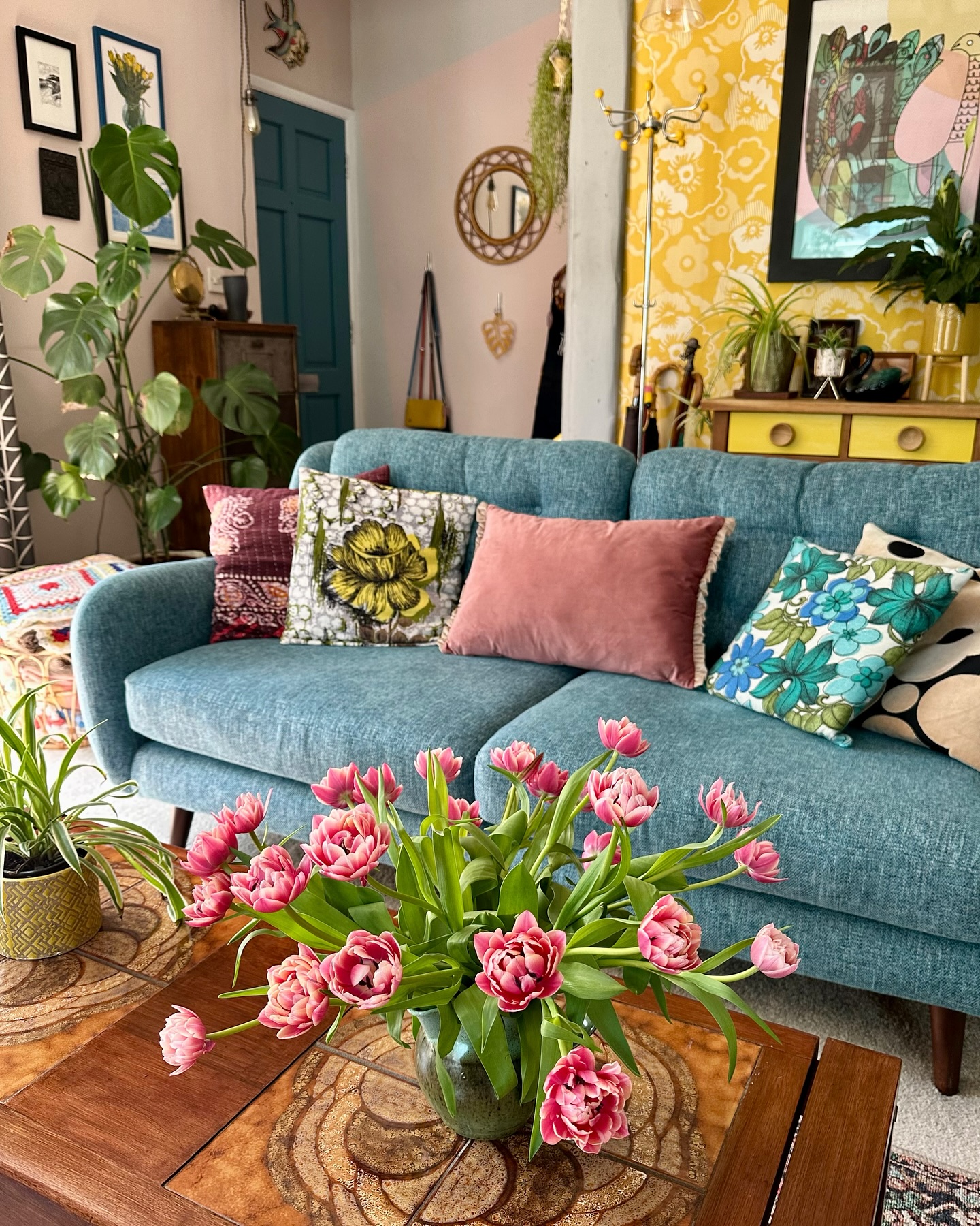 5. Connect a Turquoise Sofa with Vintage Florals