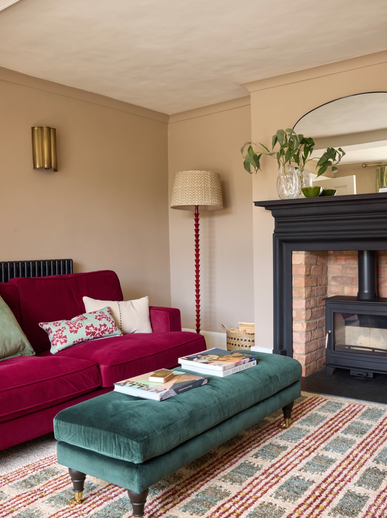 17. Use a Turquoise Ottoman as the Color Bridge