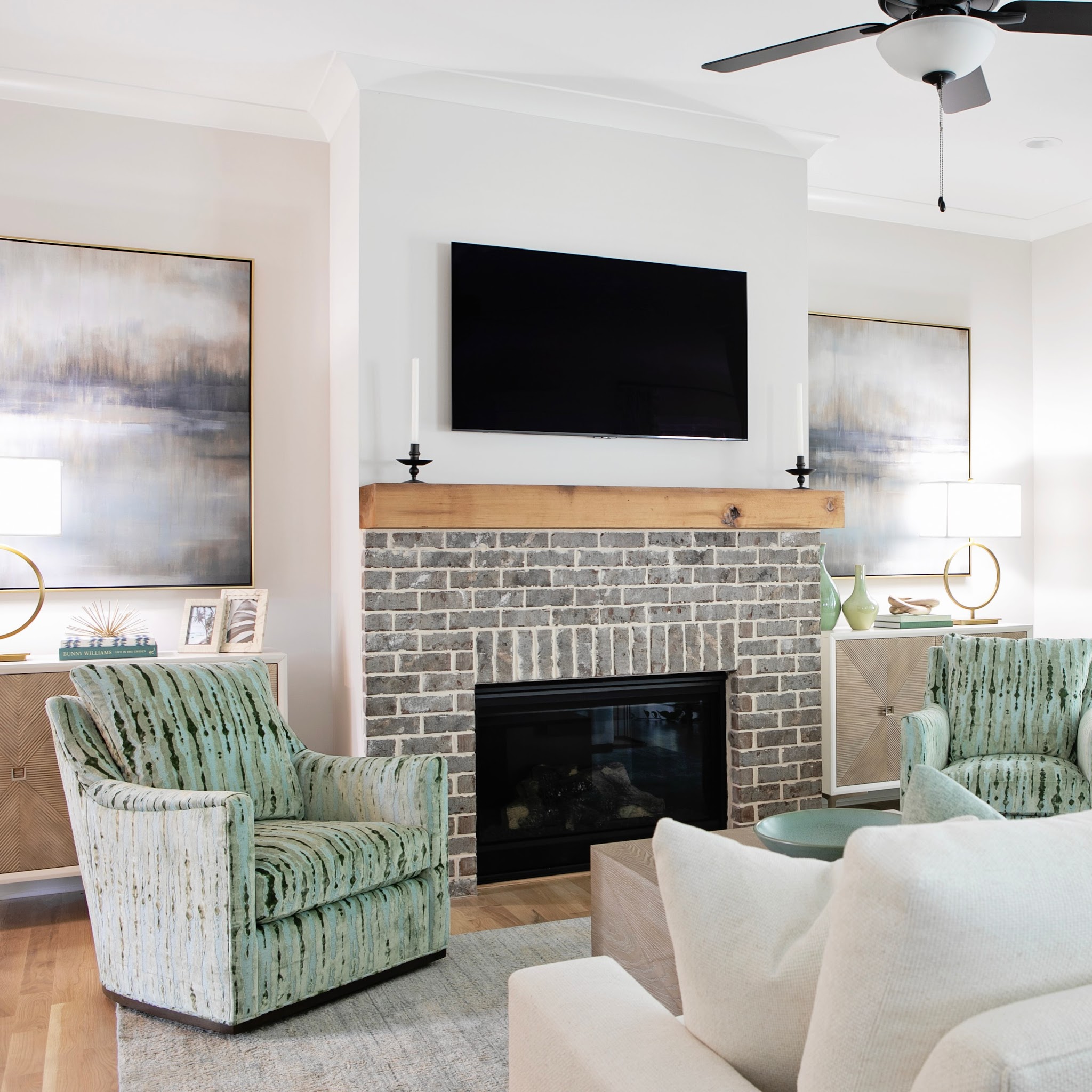2. Balance the TV With Tall Artwork