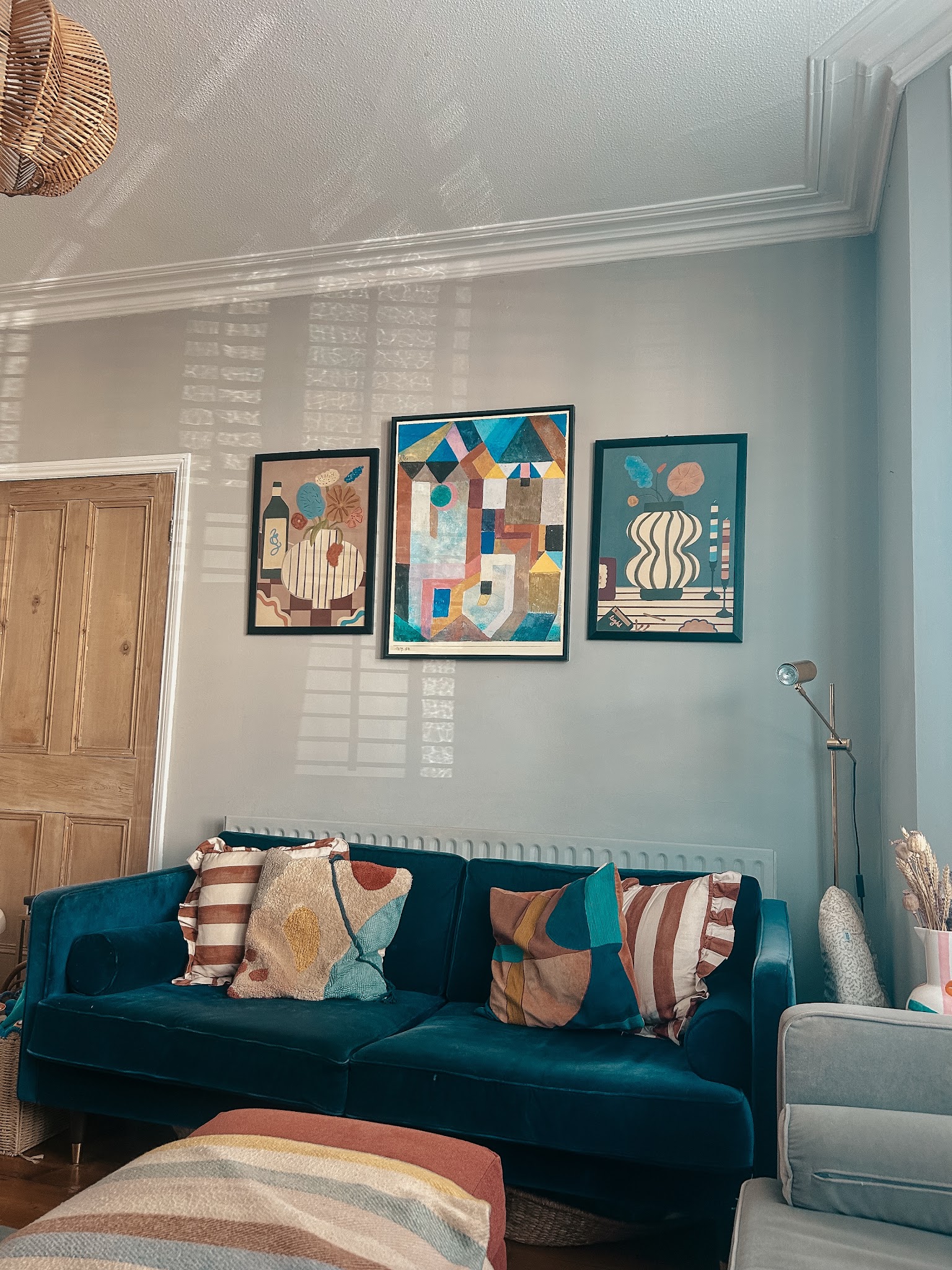 6. Refresh Period Trim with Colorful Modern Artwork