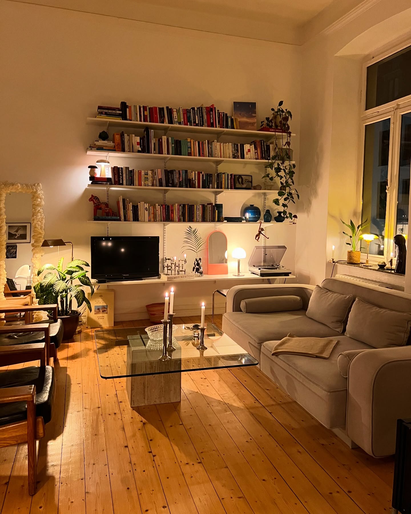18. Layer Low Lamps Around a Book Filled Wall