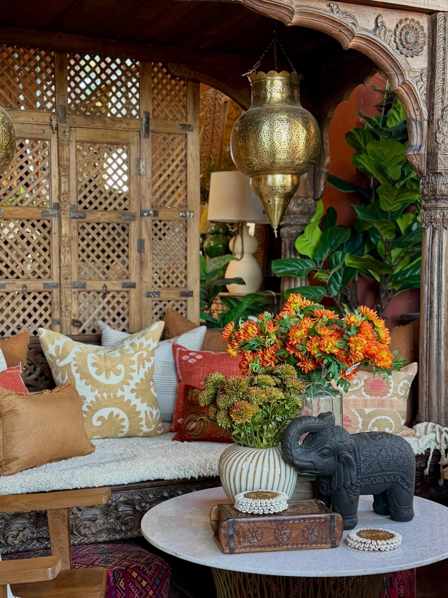 7. Frame a Cozy Daybed With a Carved Screen