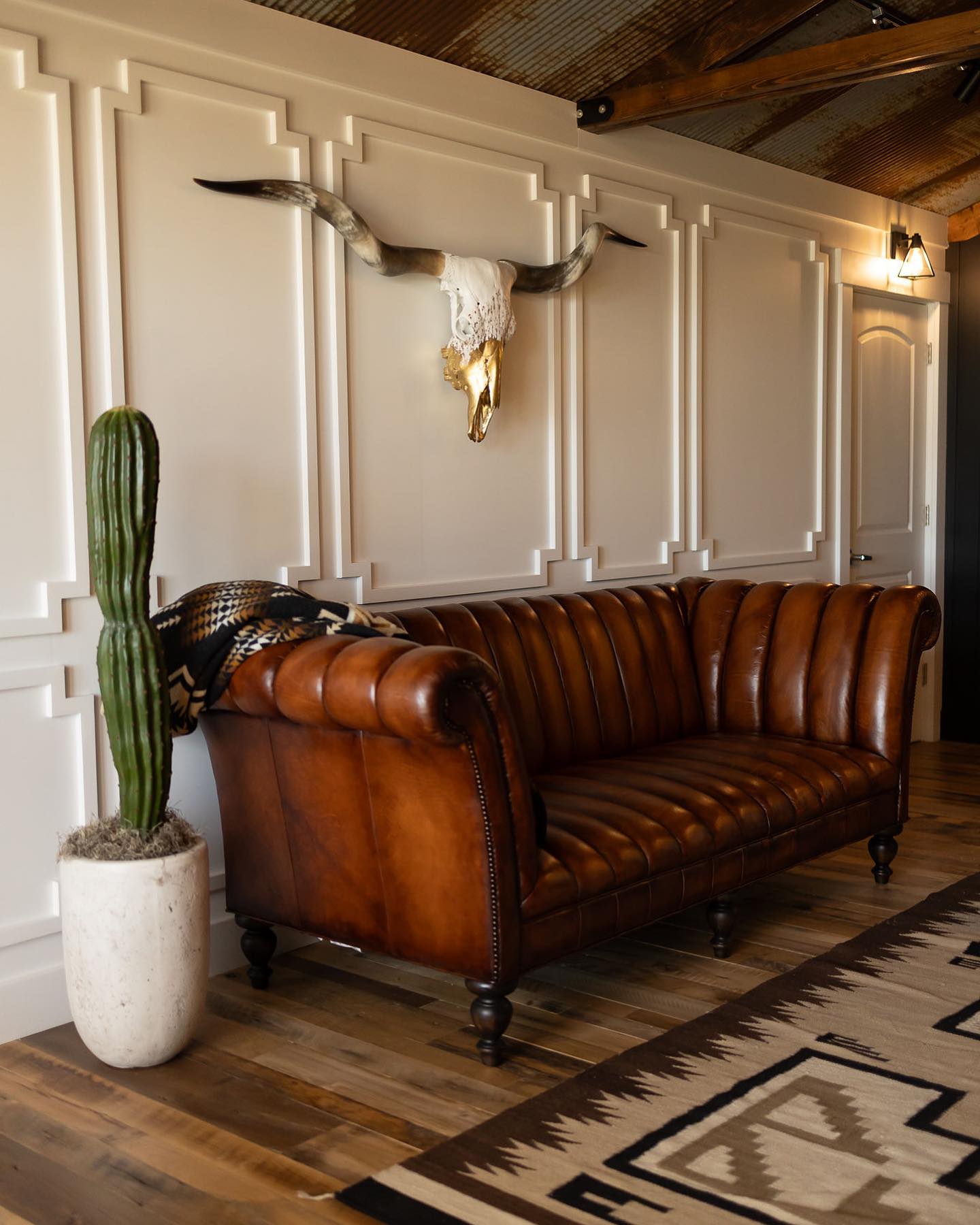 18. Frame a Leather Sofa With Geometric Molding