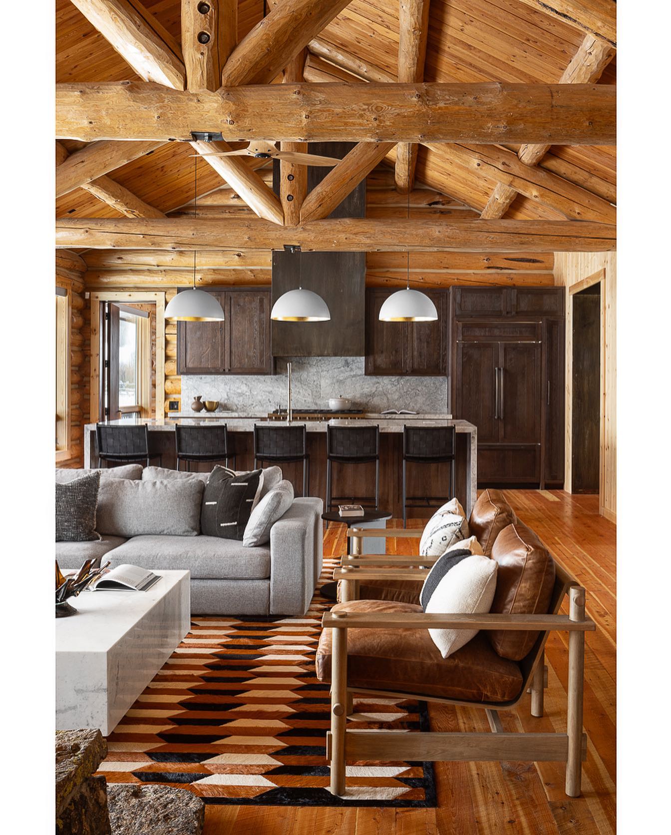 5. Mix Log Walls With Clean Modern Seating