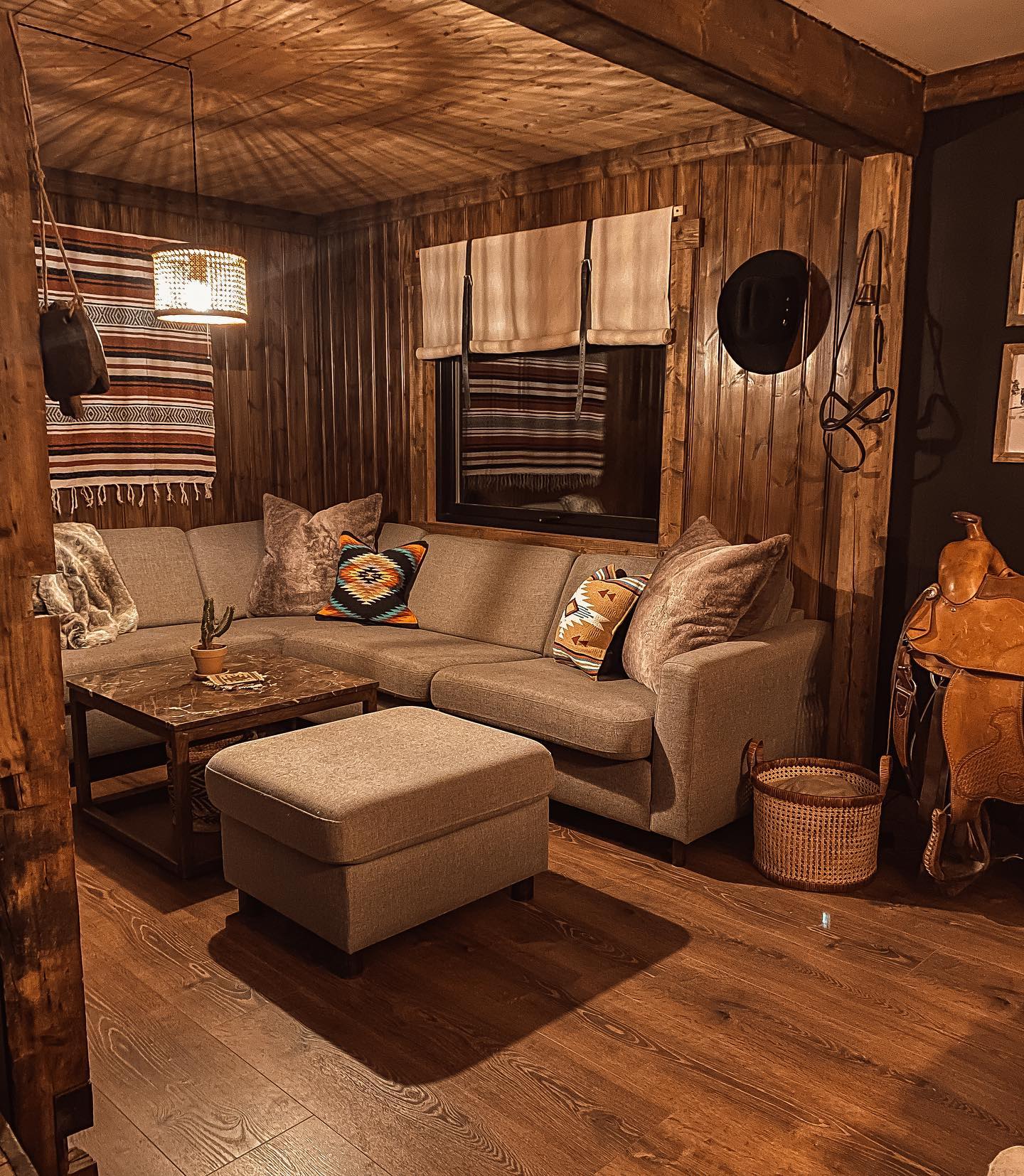 12. Warm a Small Lounge With Woven Wall Textiles