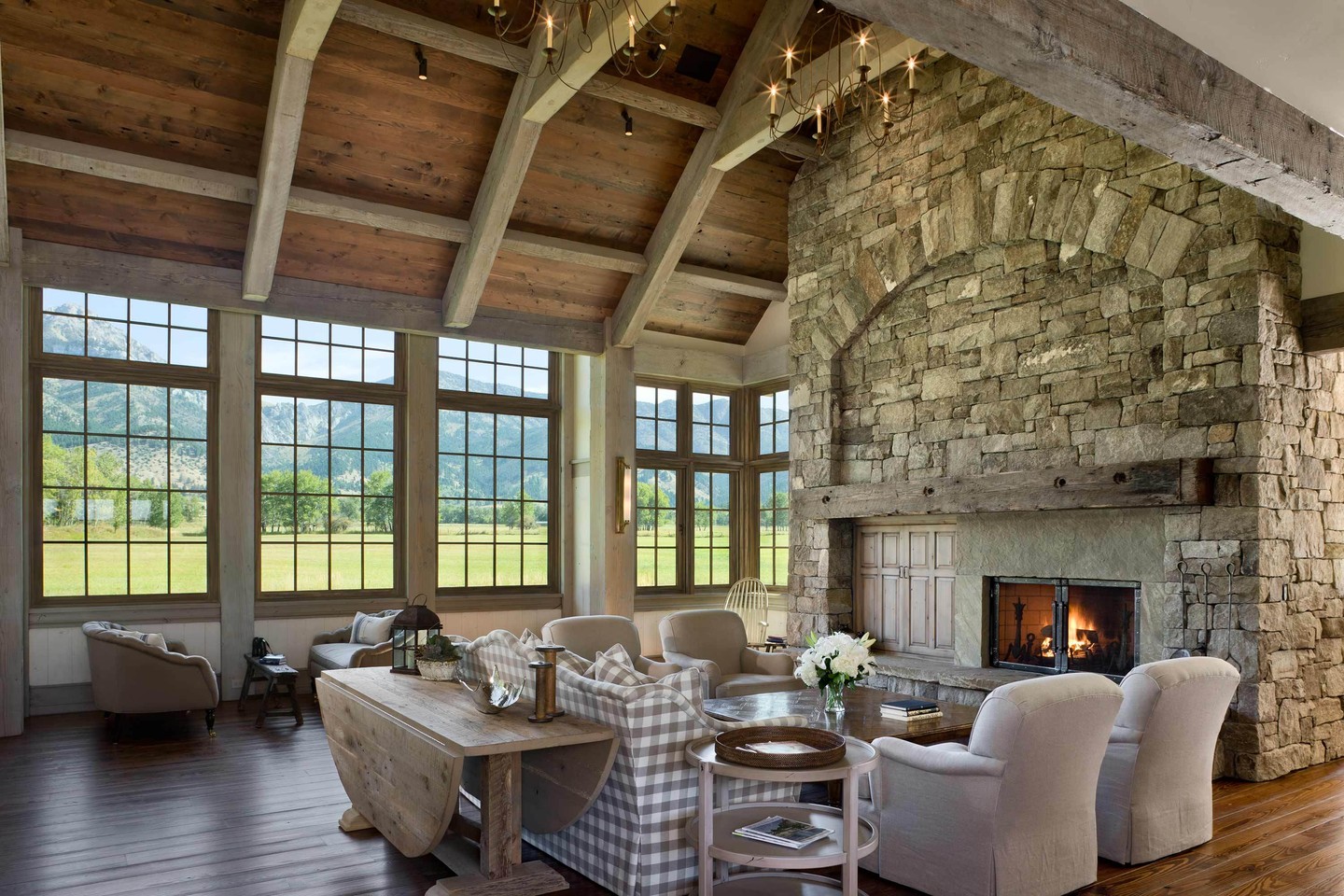 18. Lighten a Stone Hearth With Gingham Seating