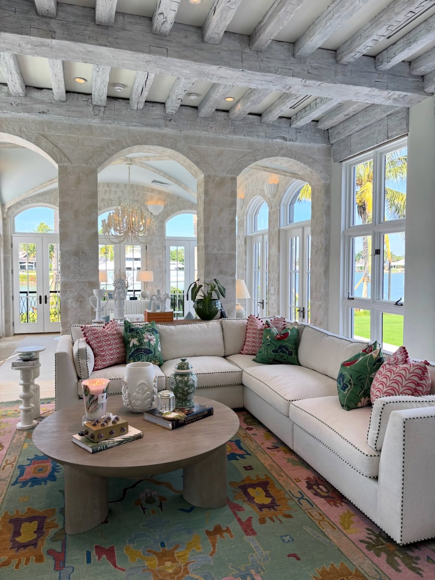 9. Give a Pale Room Playful Pillows and a Storybook Rug