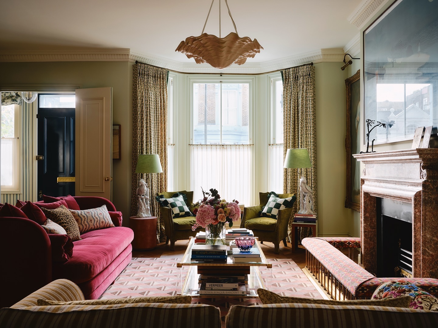 11. Float a Ruffled Pendant Above Traditional Seating