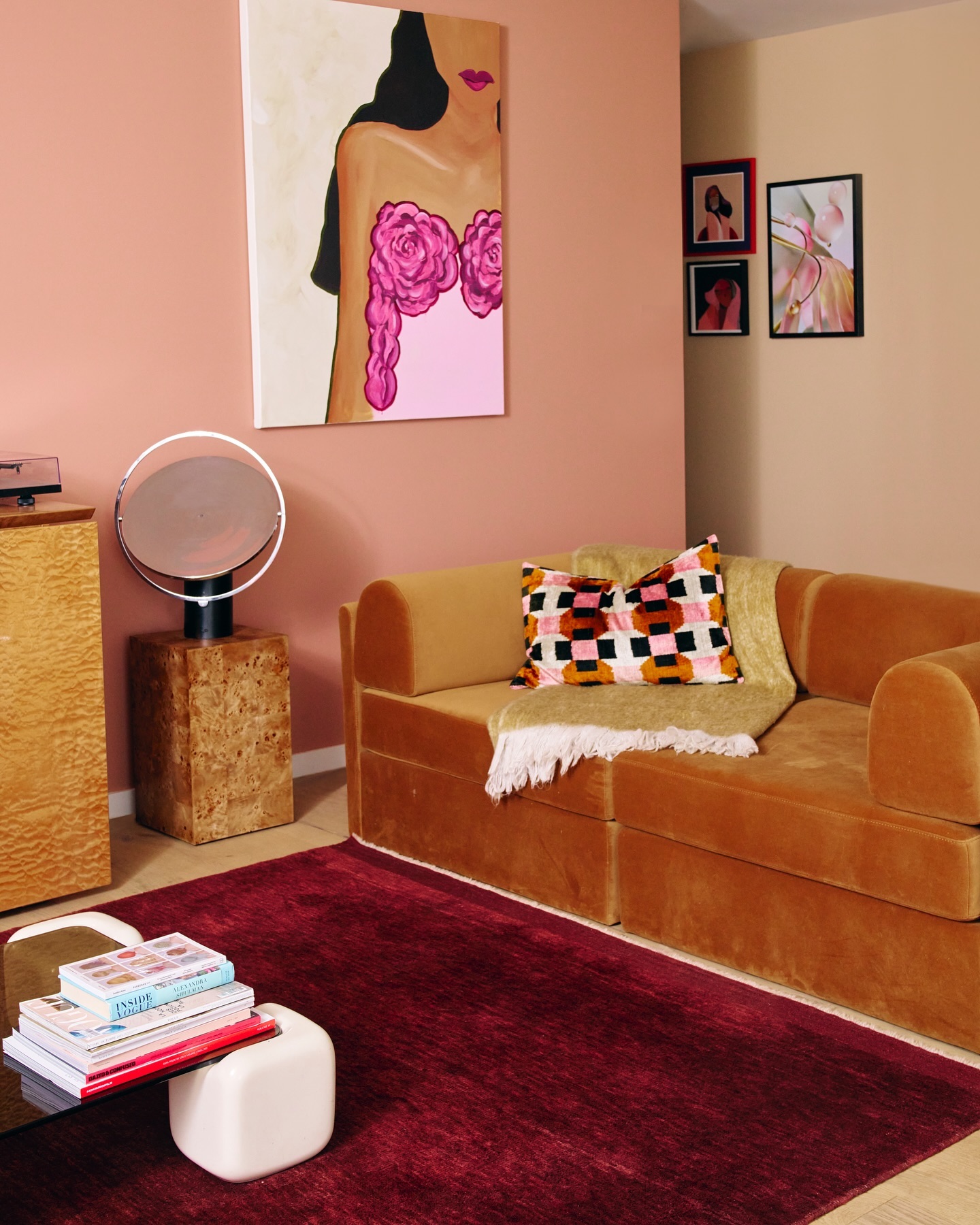 19. Choose a Scalloped Sofa Under Playful Artwork