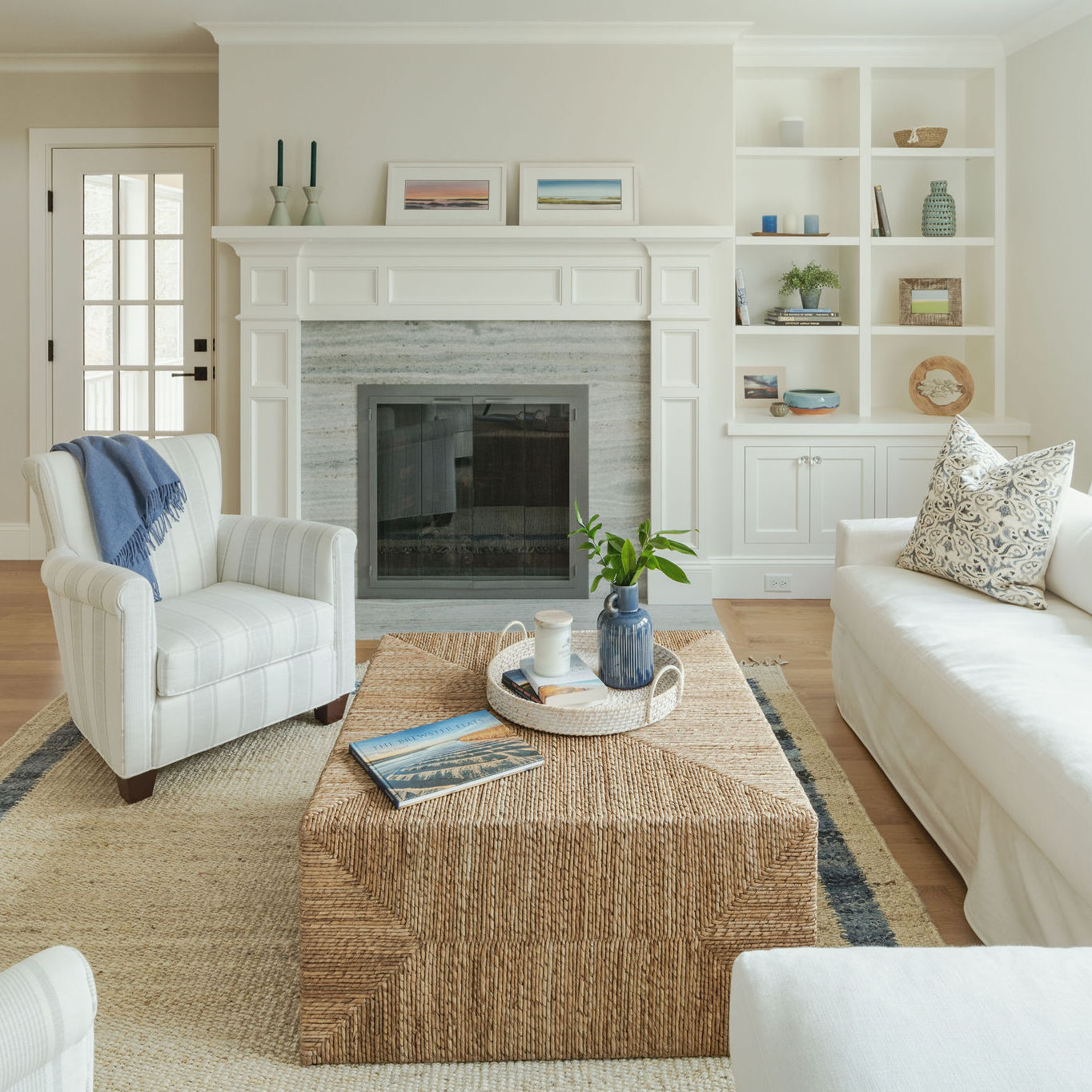 10. Warm White Upholstery with a Woven Coffee Table