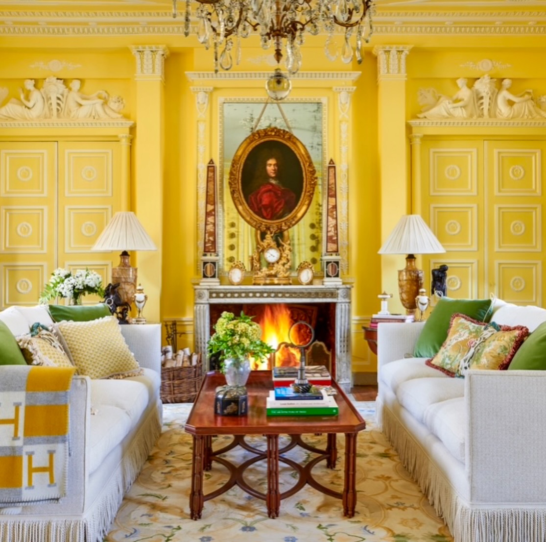 14. Set White Sofas Against Sunny Yellow Walls