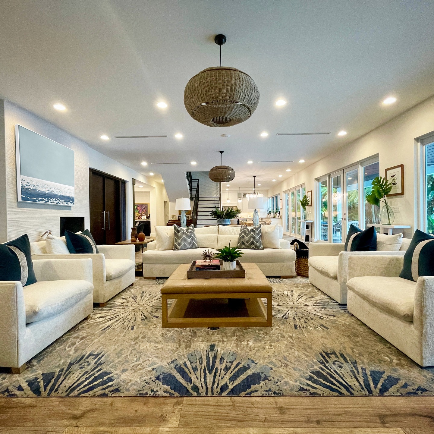 20. Anchor a White Seating Group with a Bold Blue Rug