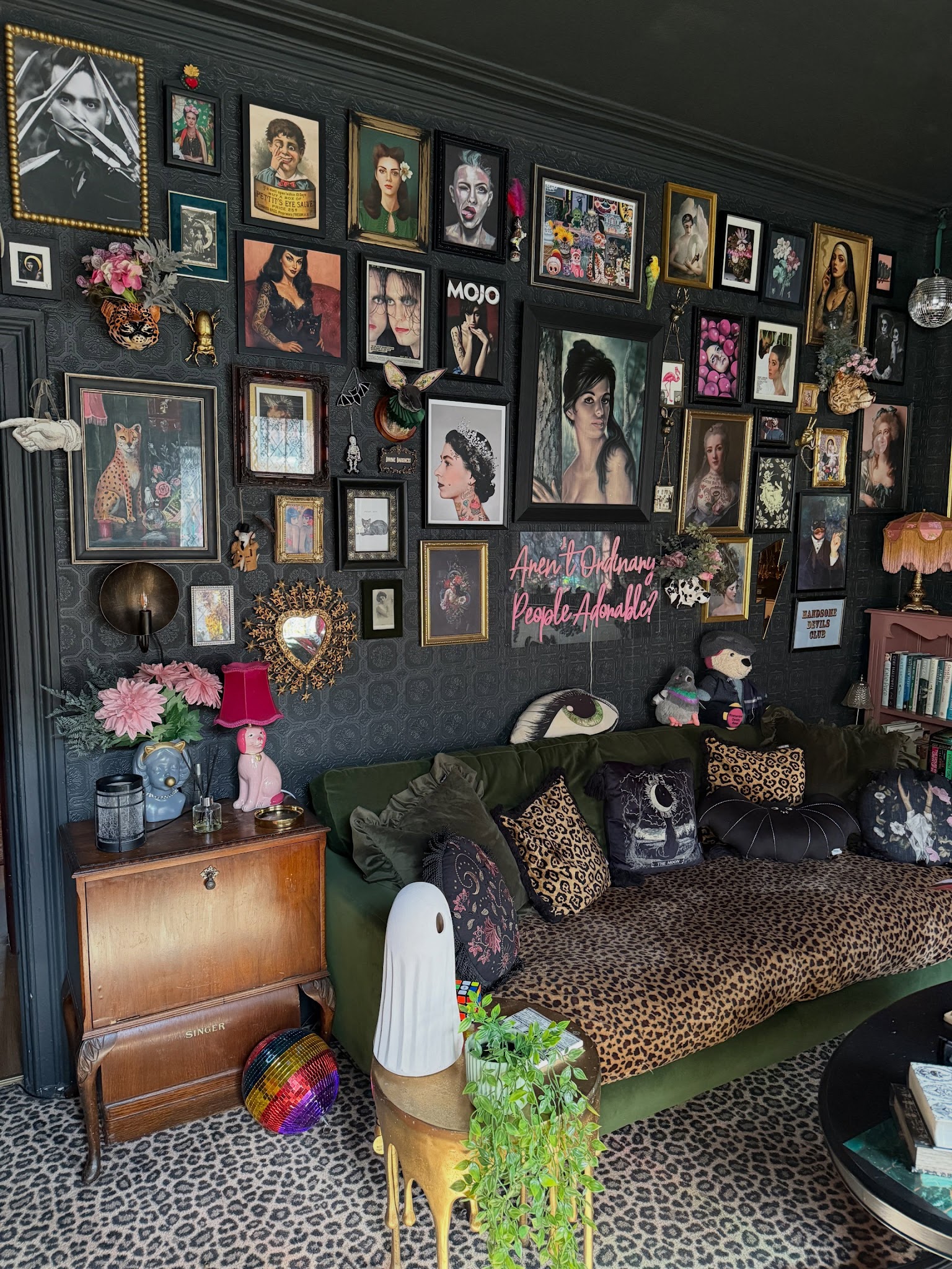 7. Give a Portrait Wall a Playful Witchy Twist