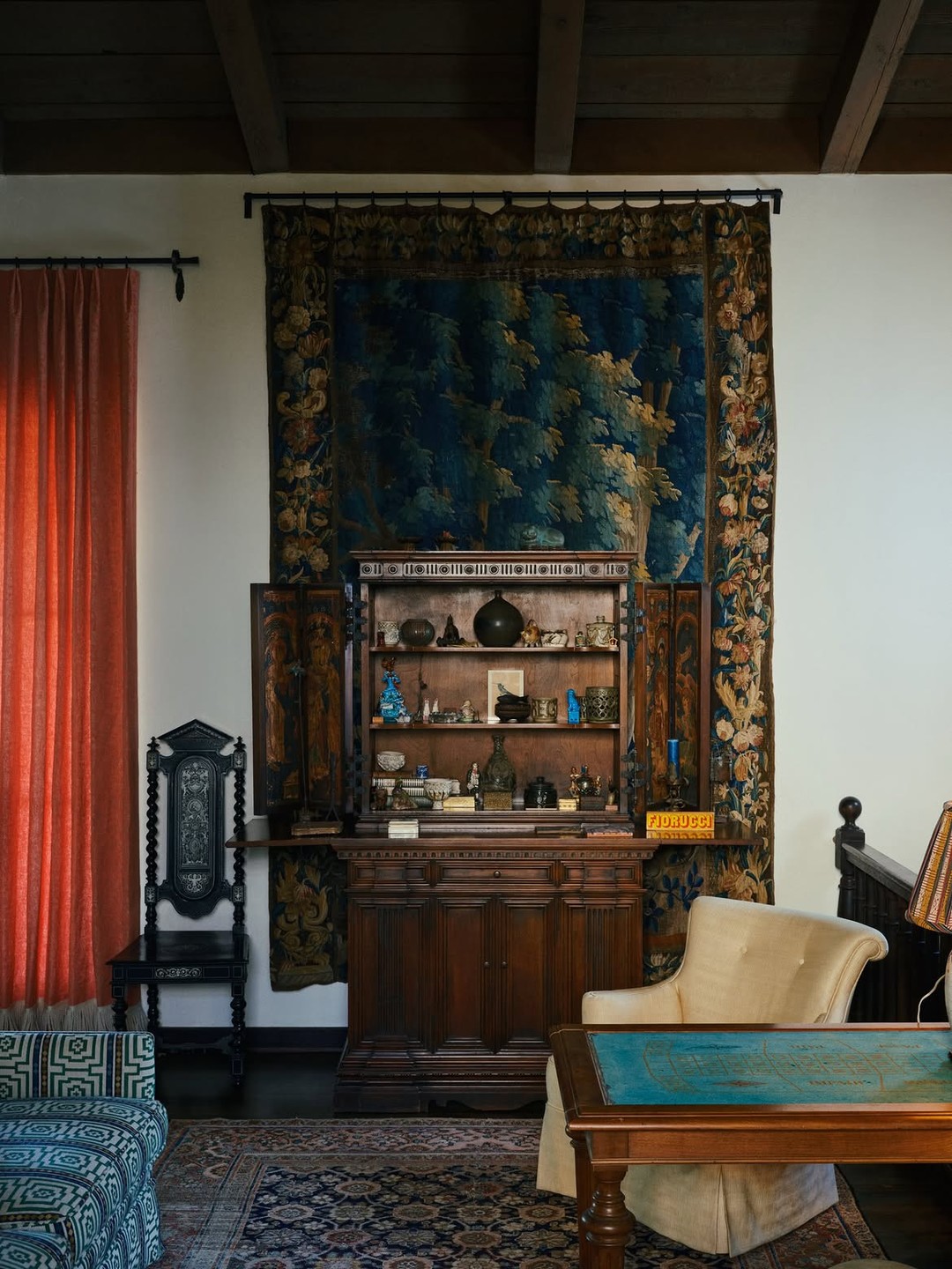 18. Frame a Curiosity Cabinet With a Woodland Tapestry