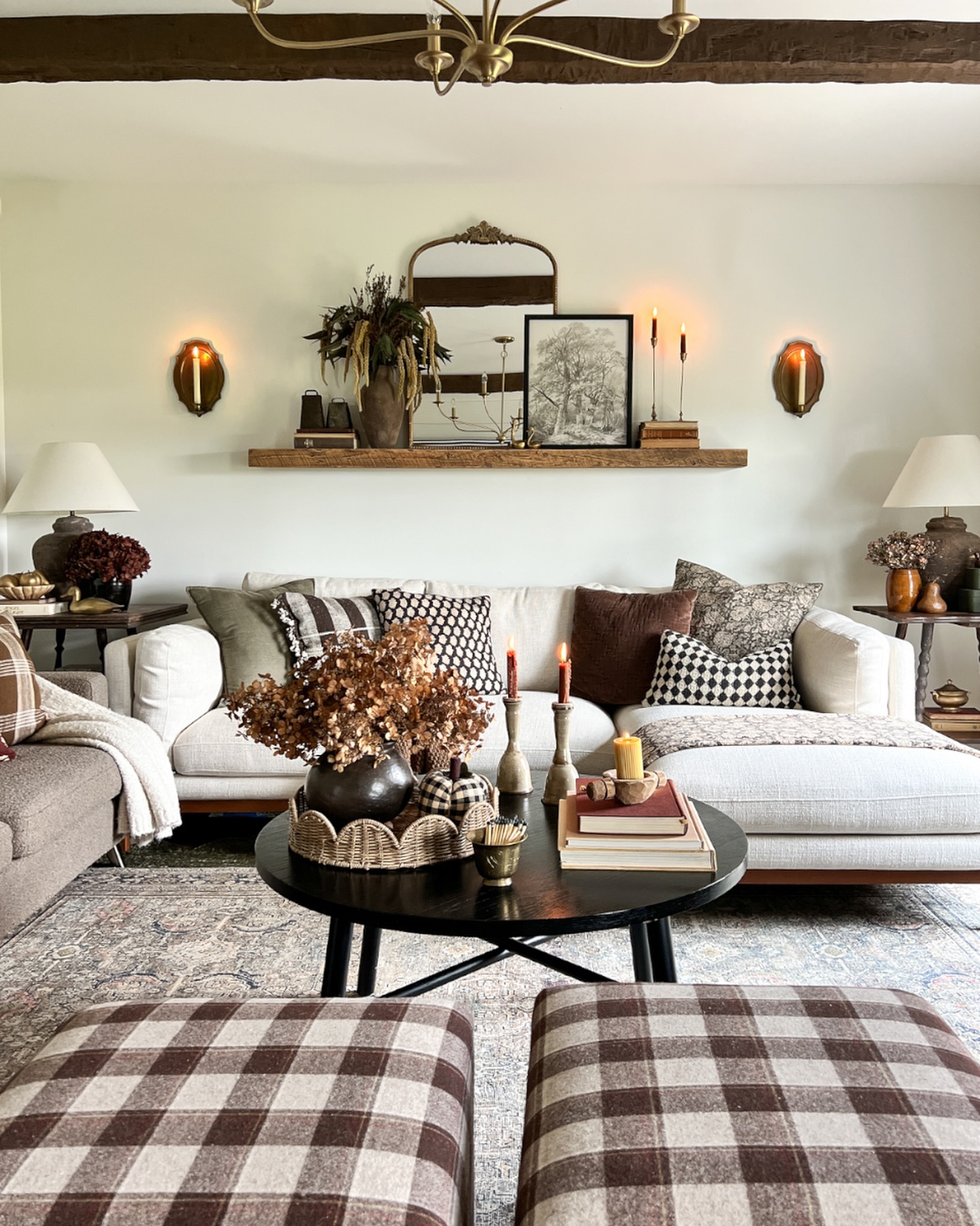 20. Warm Pale Walls With Candle Sconces and Dried Botanicals