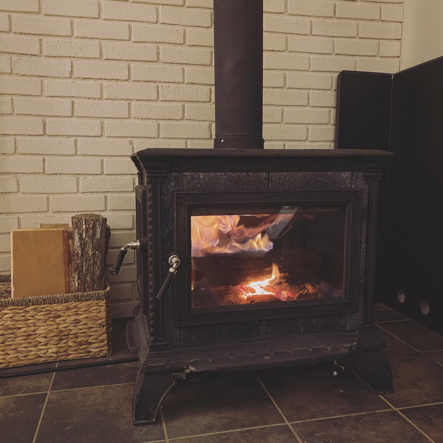 3. Let a Traditional Stove Stand Against Pale Brick