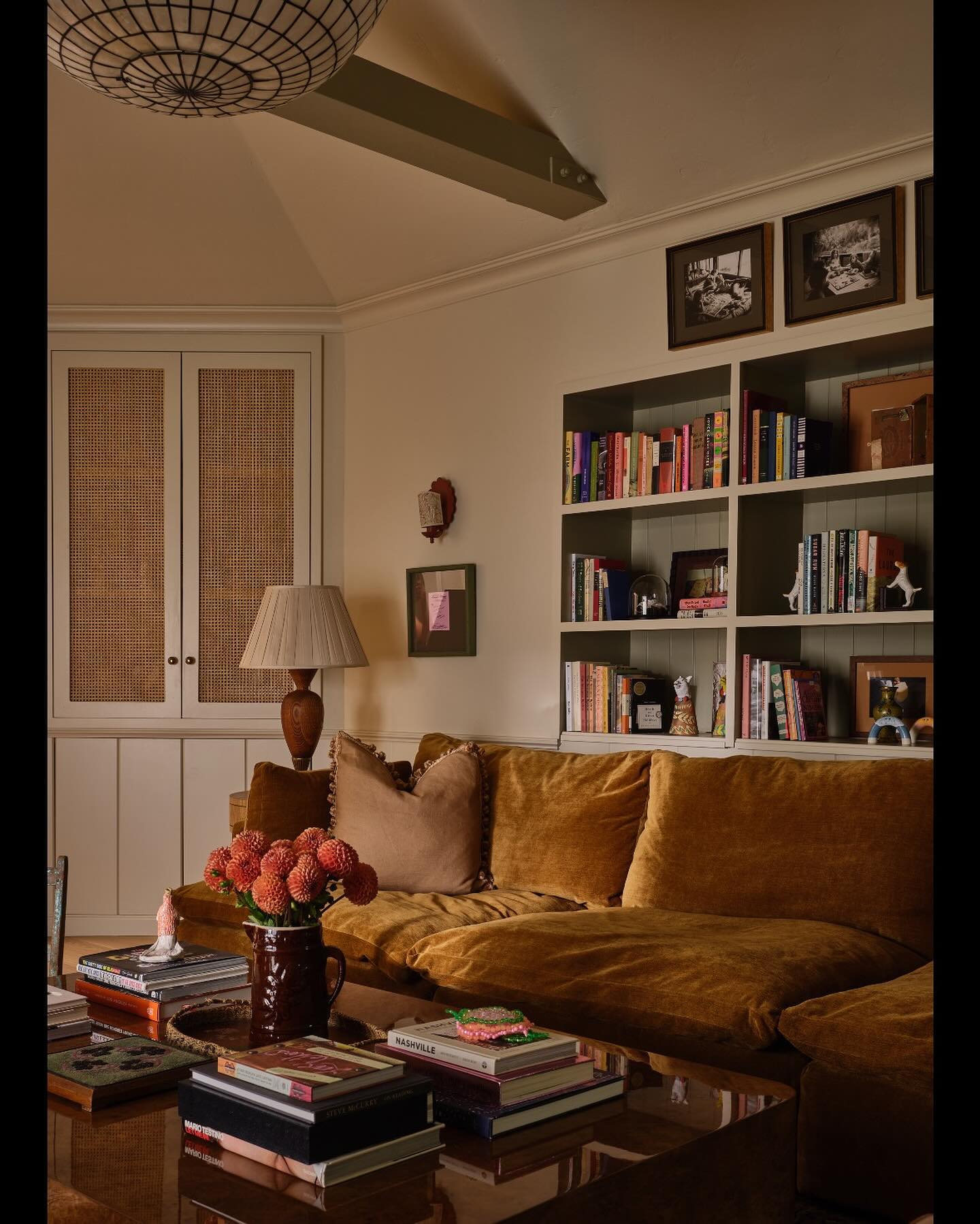 5. Anchor a Bookish Room With a Mustard Sofa