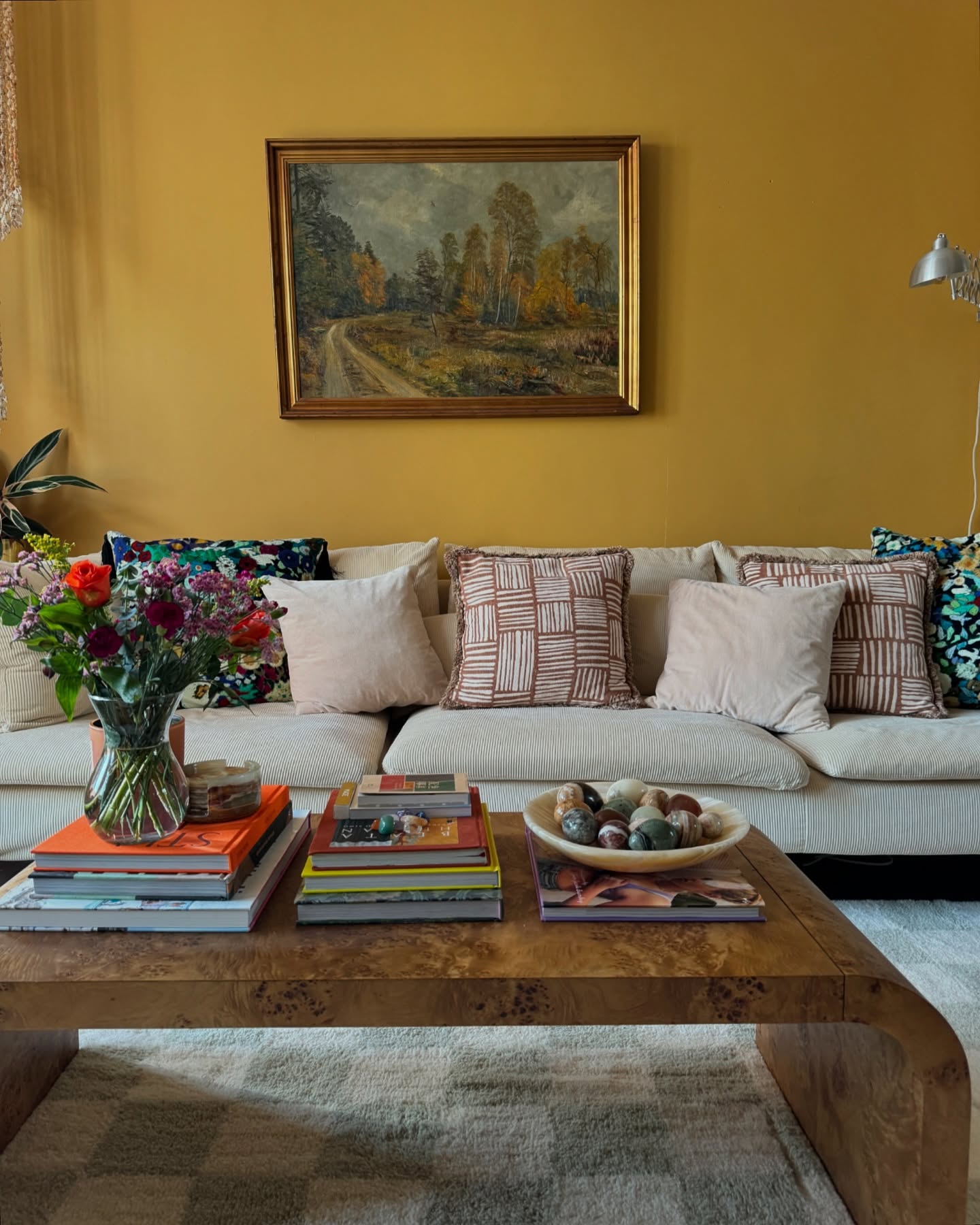 7. Refresh Ochre Walls With Pillows You Own