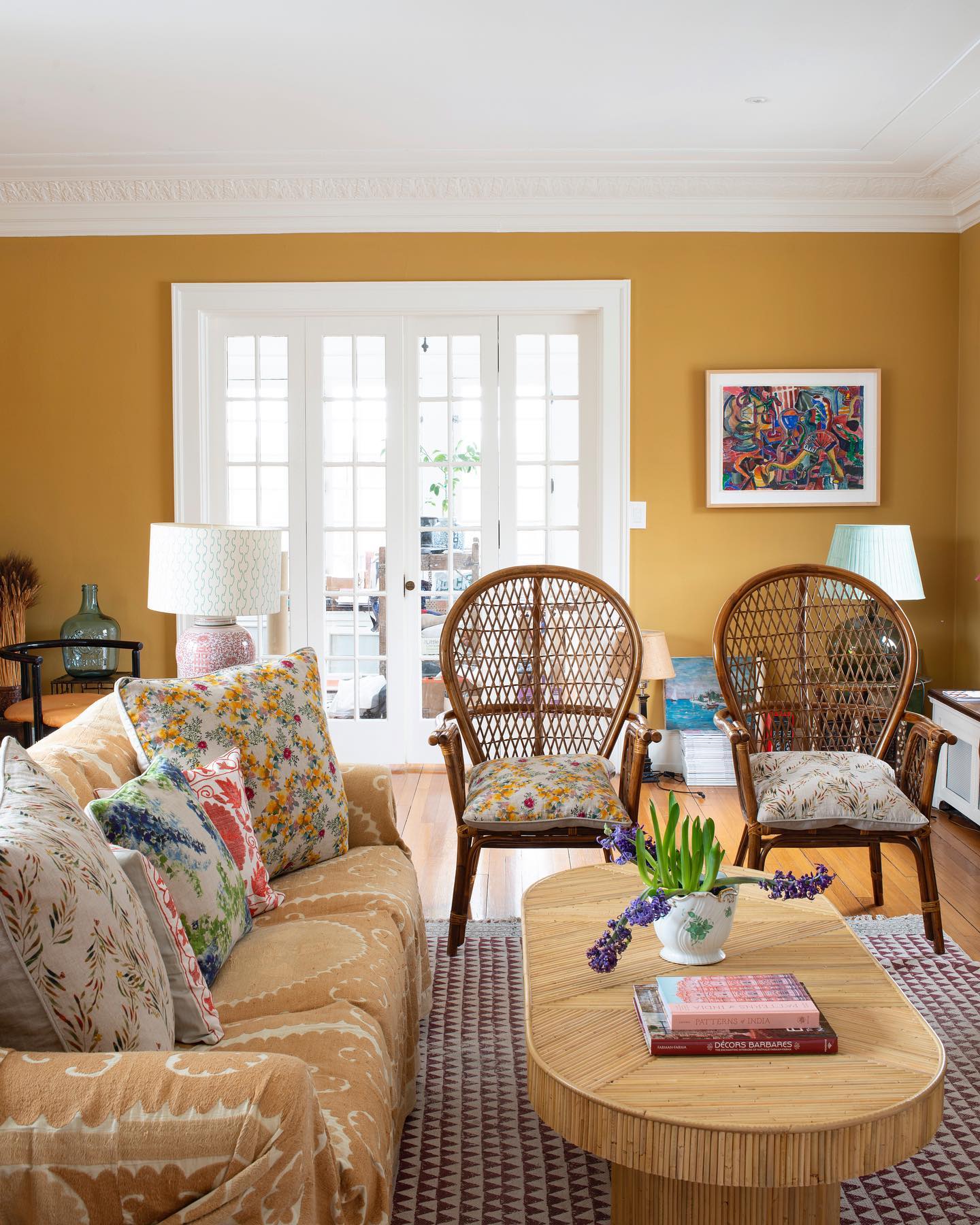 8. Balance Golden Walls With Woven Furniture