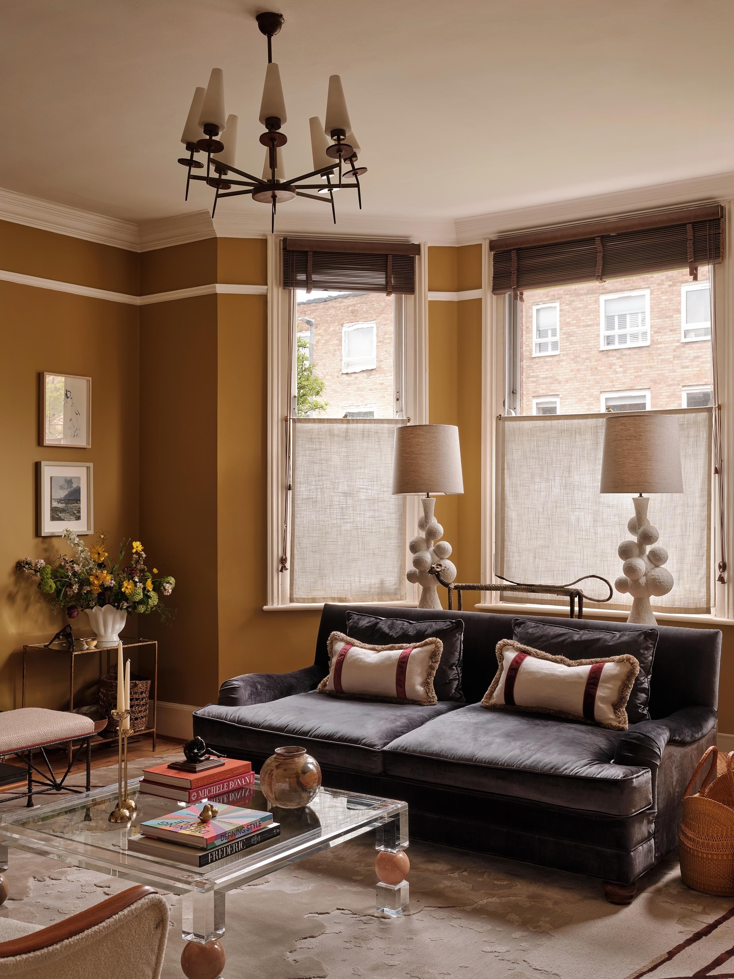 11. Deep Ochre Walls with a Charcoal Sofa
