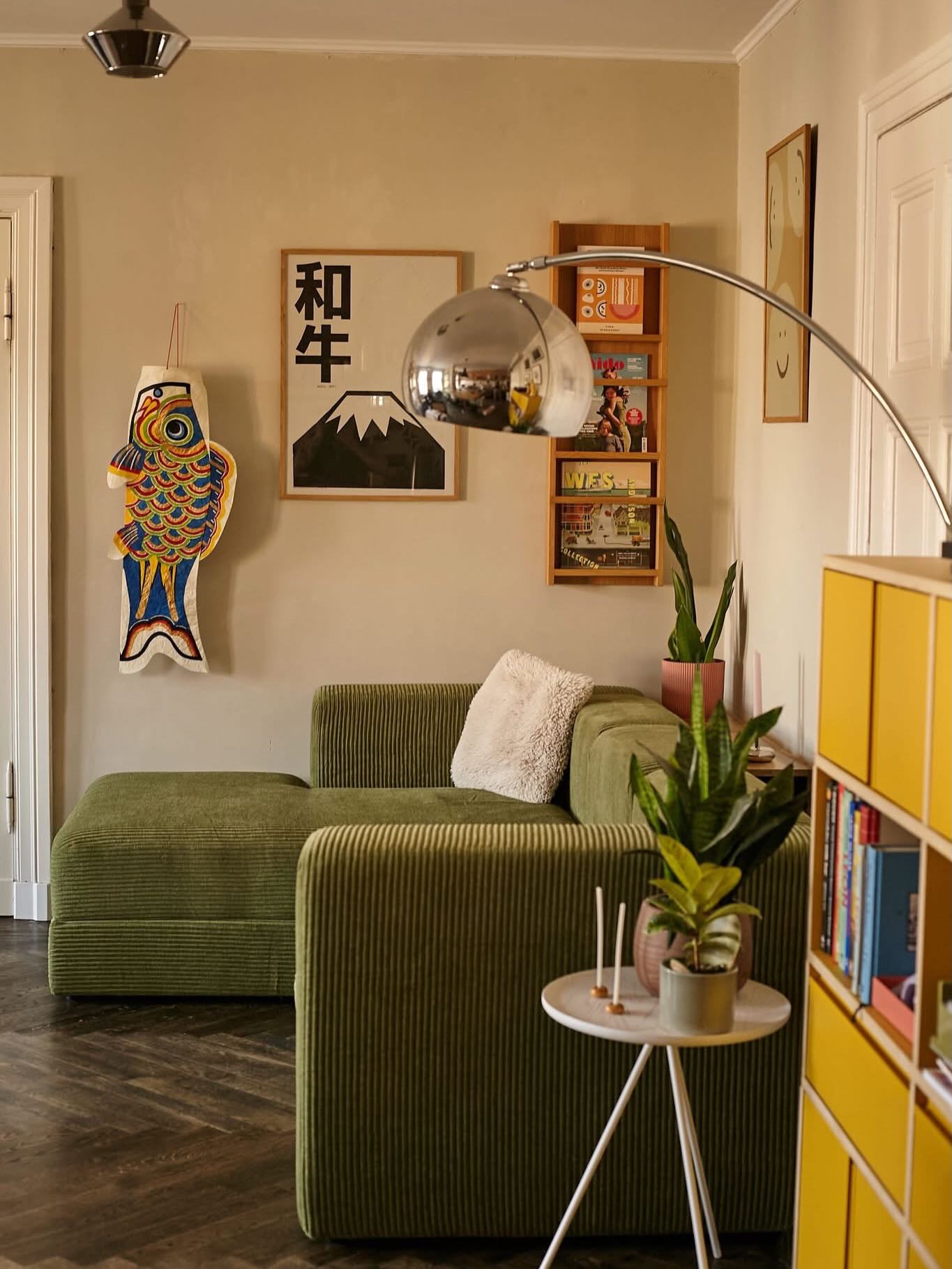15. Yellow Storage Beside an Olive Sofa