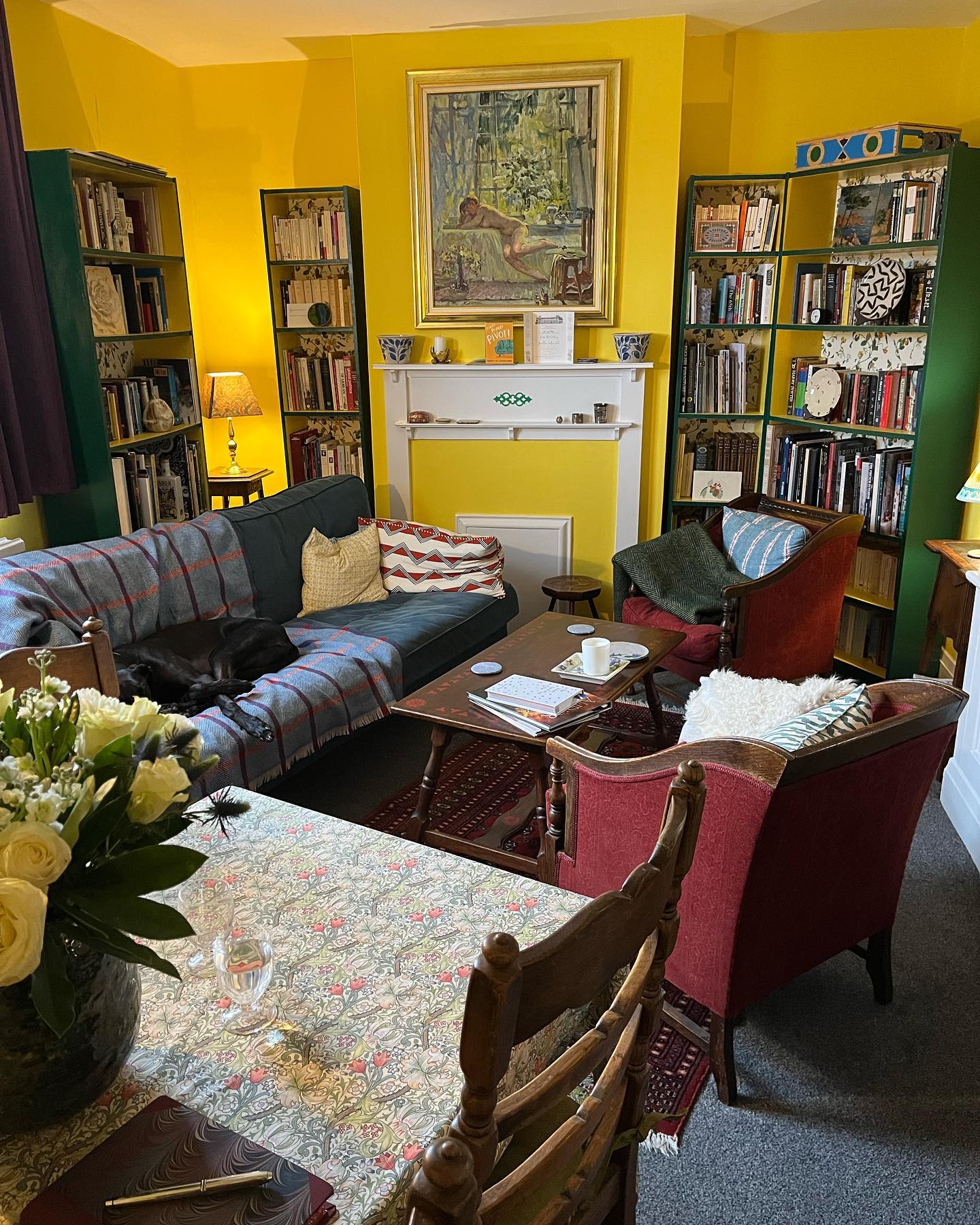 17. A Yellow Reading Room with Collected Furniture