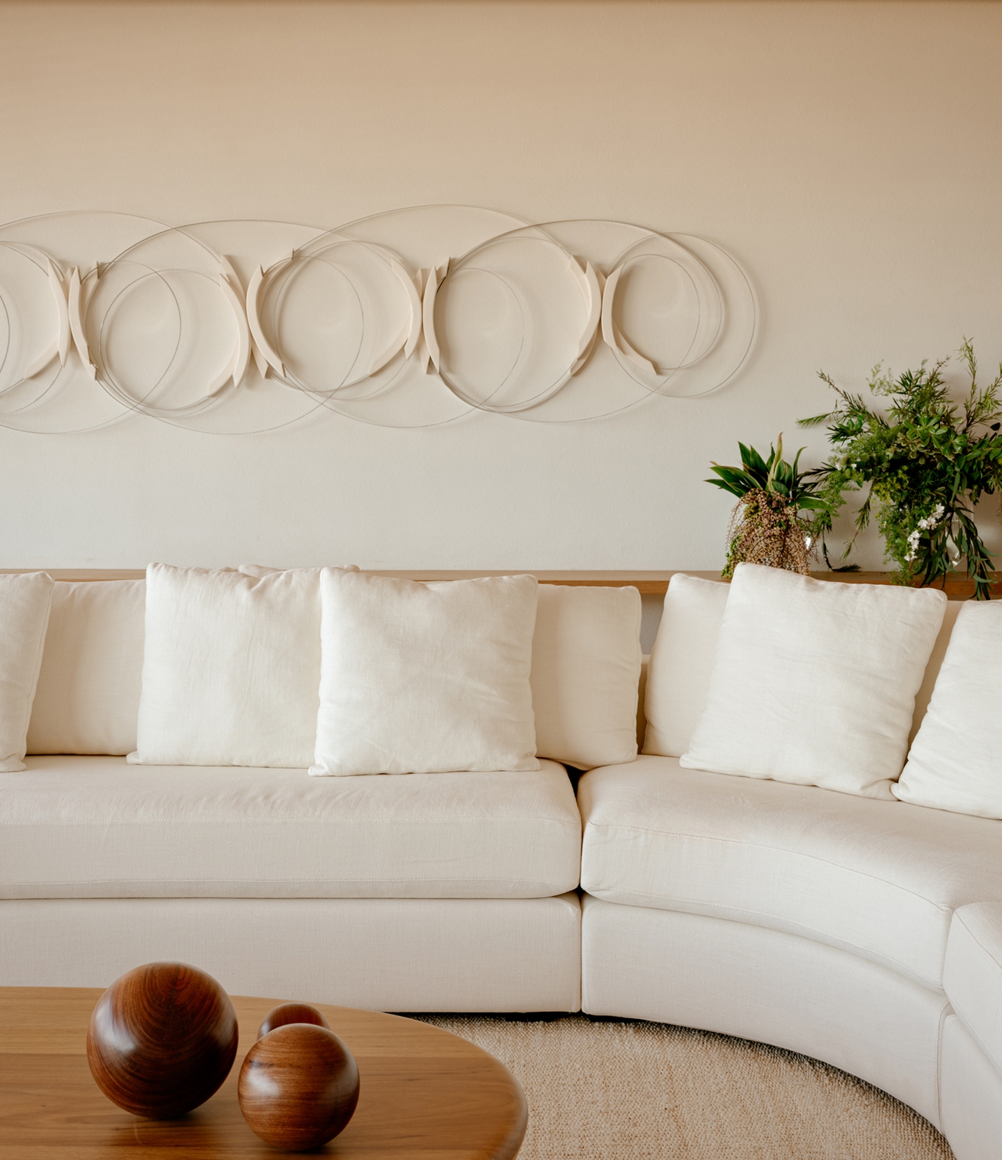 4. Repeat Soft Circles Above the Sofa