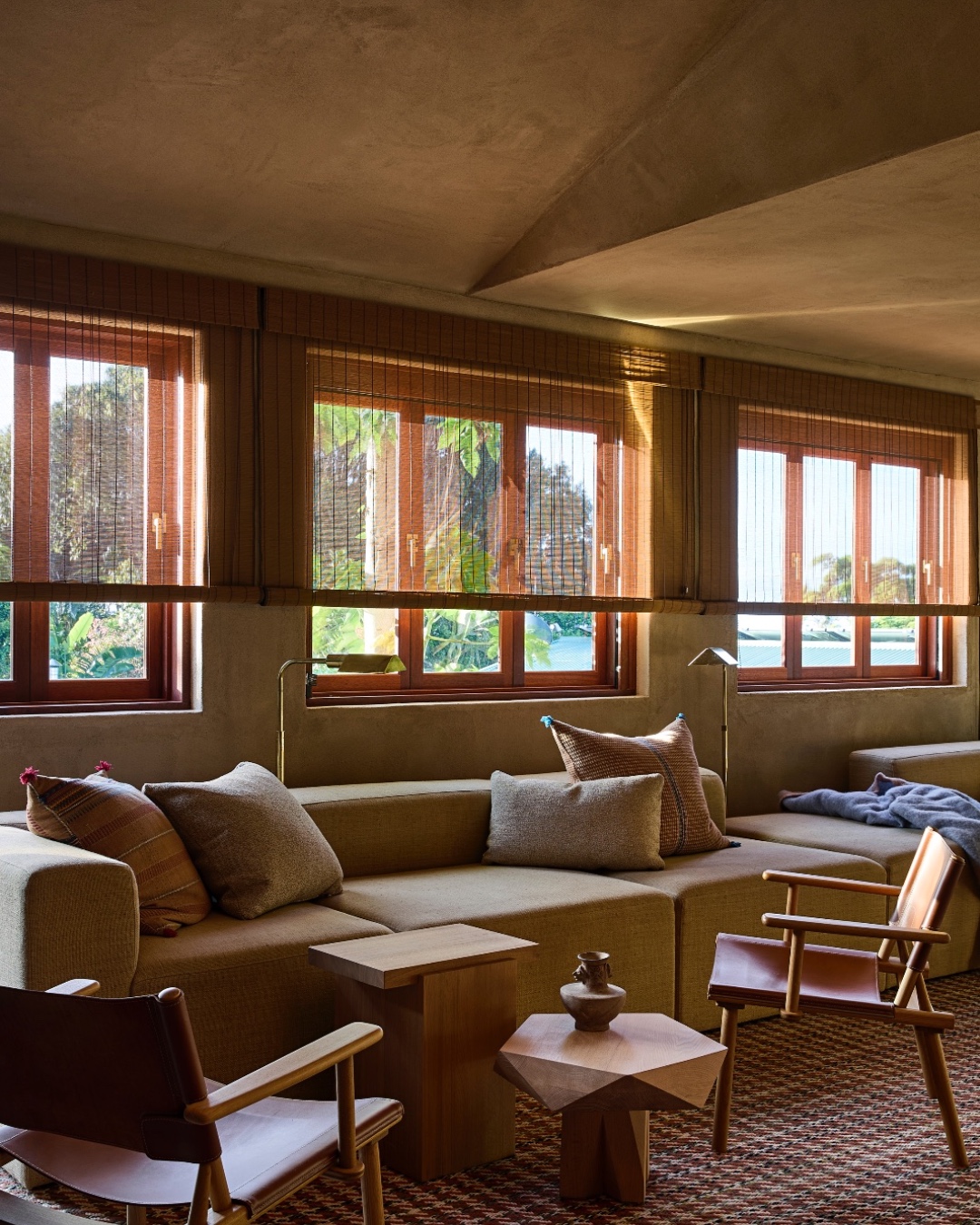 11. Pair Low Seating With Small Wood Tables