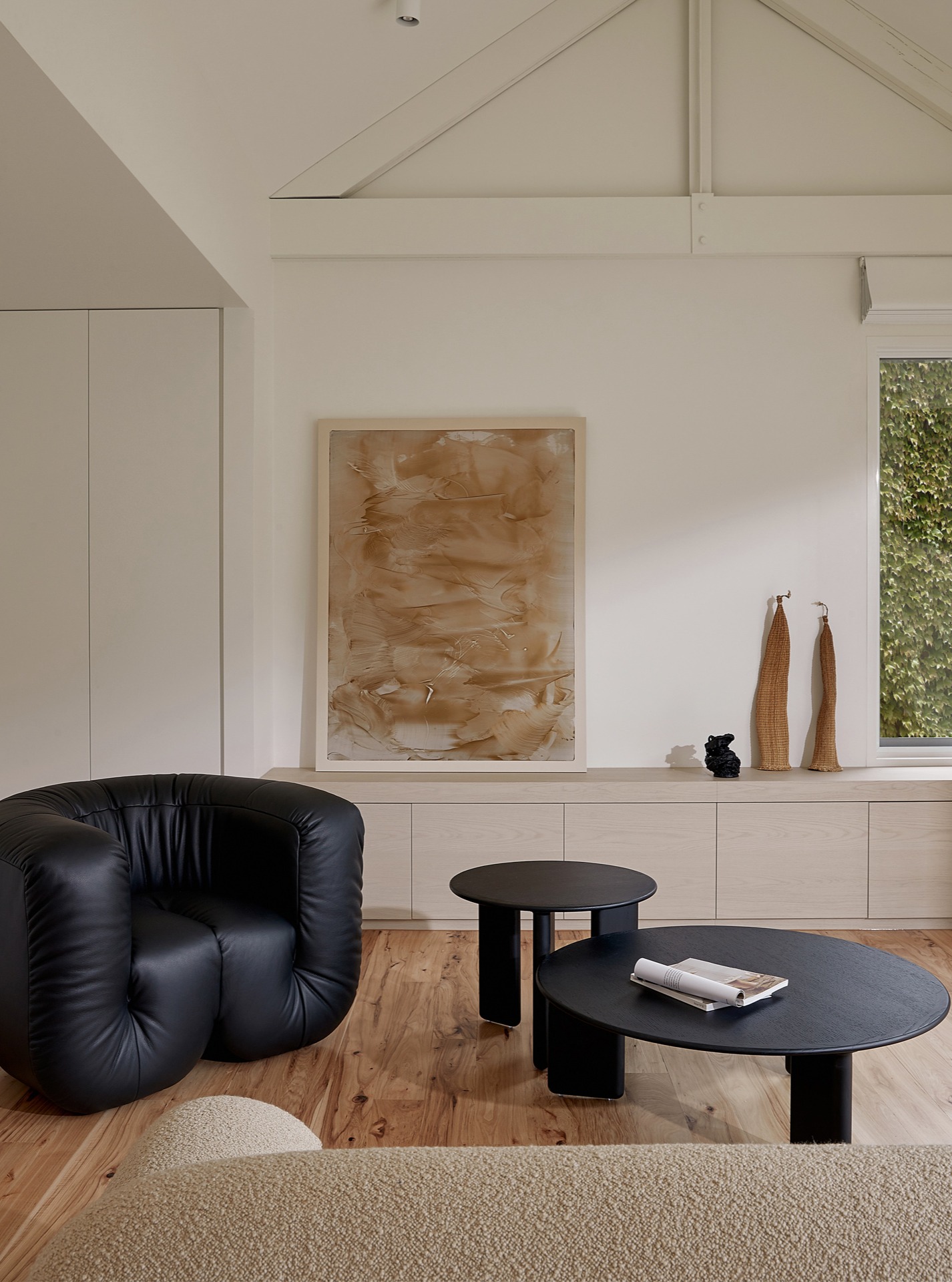 13. Anchor a Pale Room With Sculptural Black Pieces