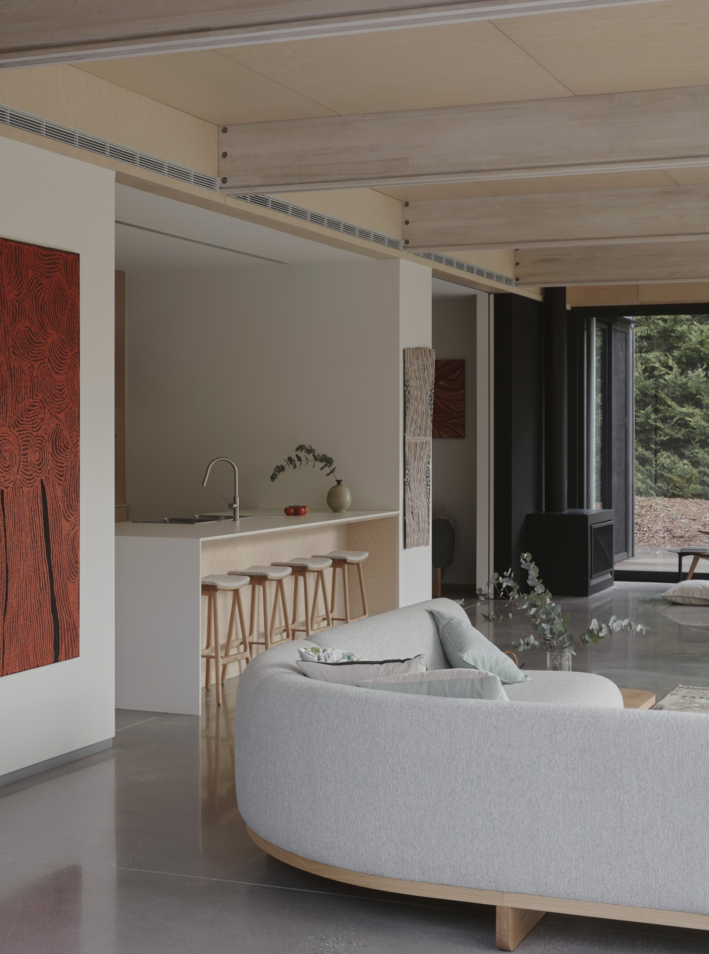 20. Carry Pale Timber Across an Open Plan